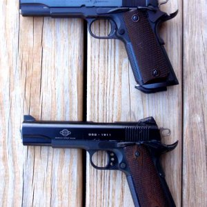 T 1911 L GSG L This is a matched pair, 1911 45ACP and a 1911 GSG 22LR, same general custom work, I later welded up the Bomar 1950s rear sight cut, re 